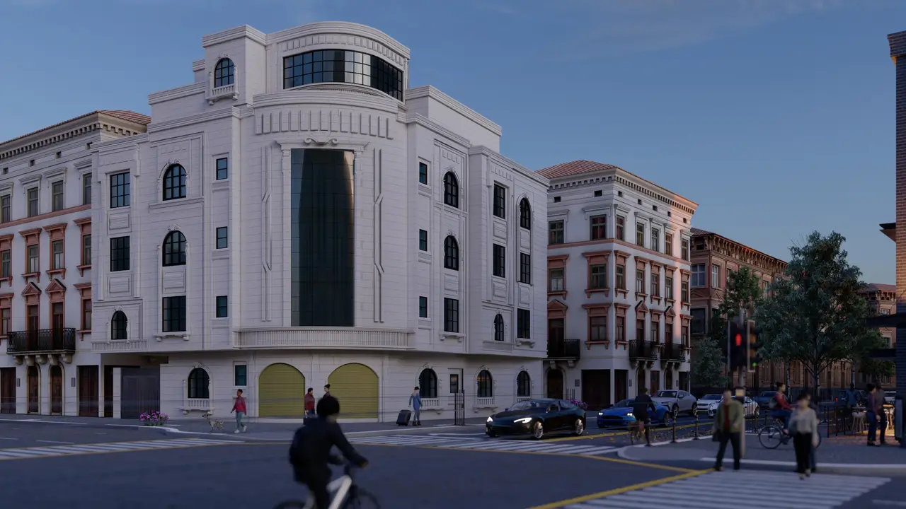 عمارة سكنية بزاوية منحنية — حجر أبيض وتفاصيل كلاسيكية — تصميم مكتب الفروي في صنعاء