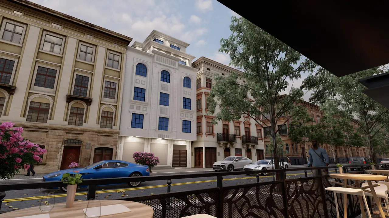 عمارة في شارع تجاري — حجر مع زجاج أزرق — تصميم مكتب الفروي في صنعاء